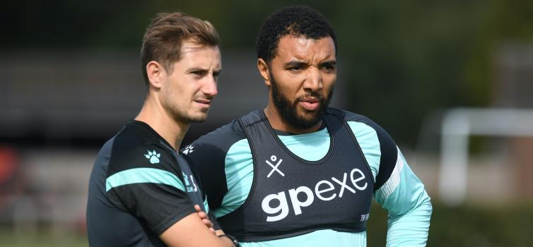 Watford's Lee Stafford with club captain Troy Deeney