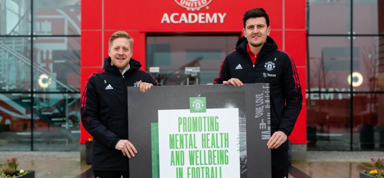 Man Utd Head of Academy Nick Cox and club captain Harry Maguire