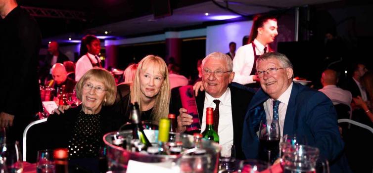 Sir Alex Ferguson with Dave Bushell and his wife and daughter (photo courtesy of Manchester United)