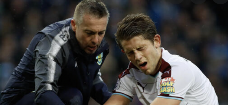 Ally Beattie (left) with Burnley defender James Tarkowski 