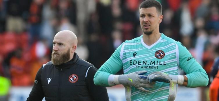 Ryan Flood (left) with Dundee United keeper Benjamin Siegrist 