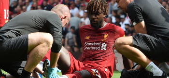 Clubs urged to re-consider touchline surfaces after Origi injury