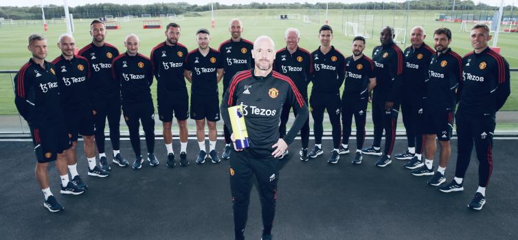 Erik ten Hag poses with the Manager of the Month Award in front of his backroom staff. Find out who they are below. 