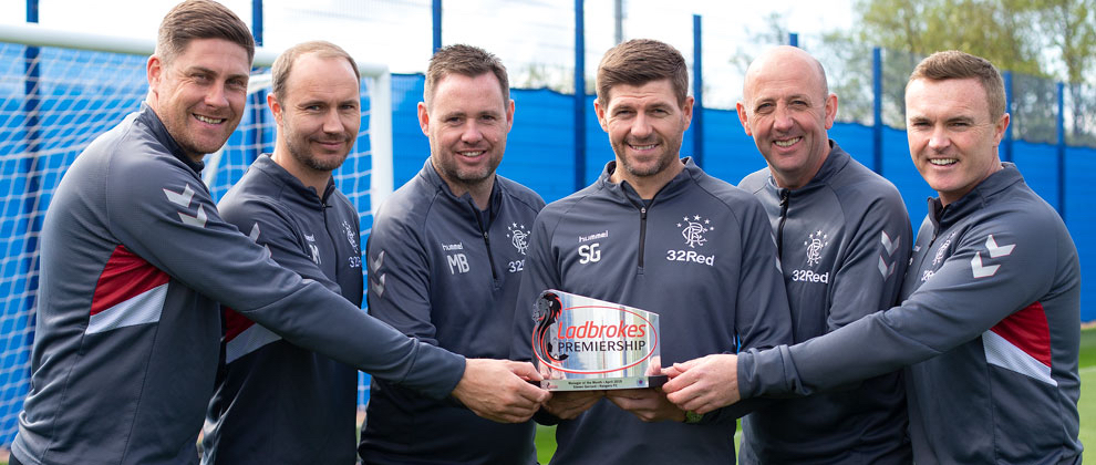 Left to right: Colin Stewart (goalkeeper coach), Jordan Milsom (Head of Performance), Michael Beale, Steven Gerrard, Gary McAllister (assistant) and Tom Culshaw (Technical Coach)